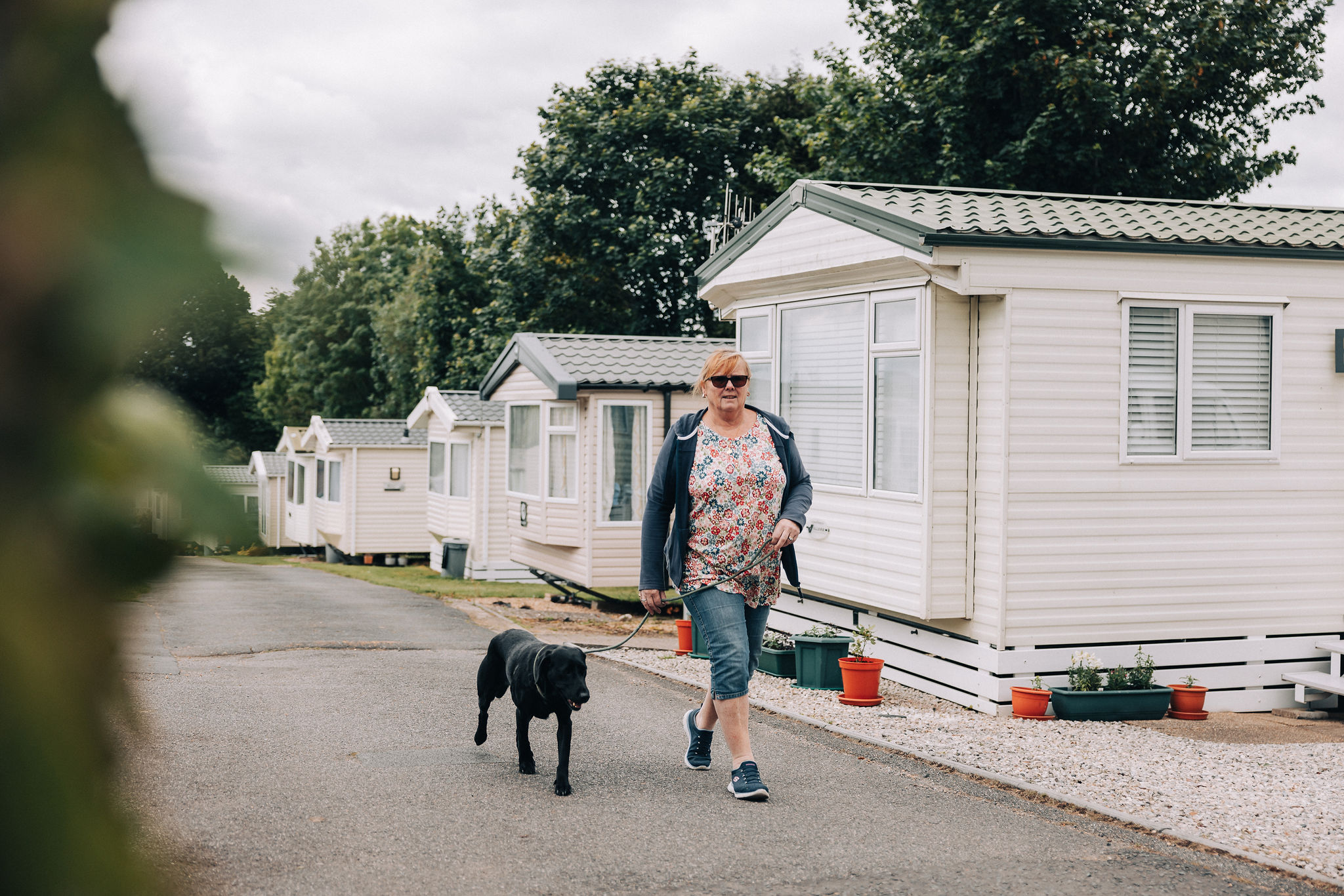 owner walking dog at merley house